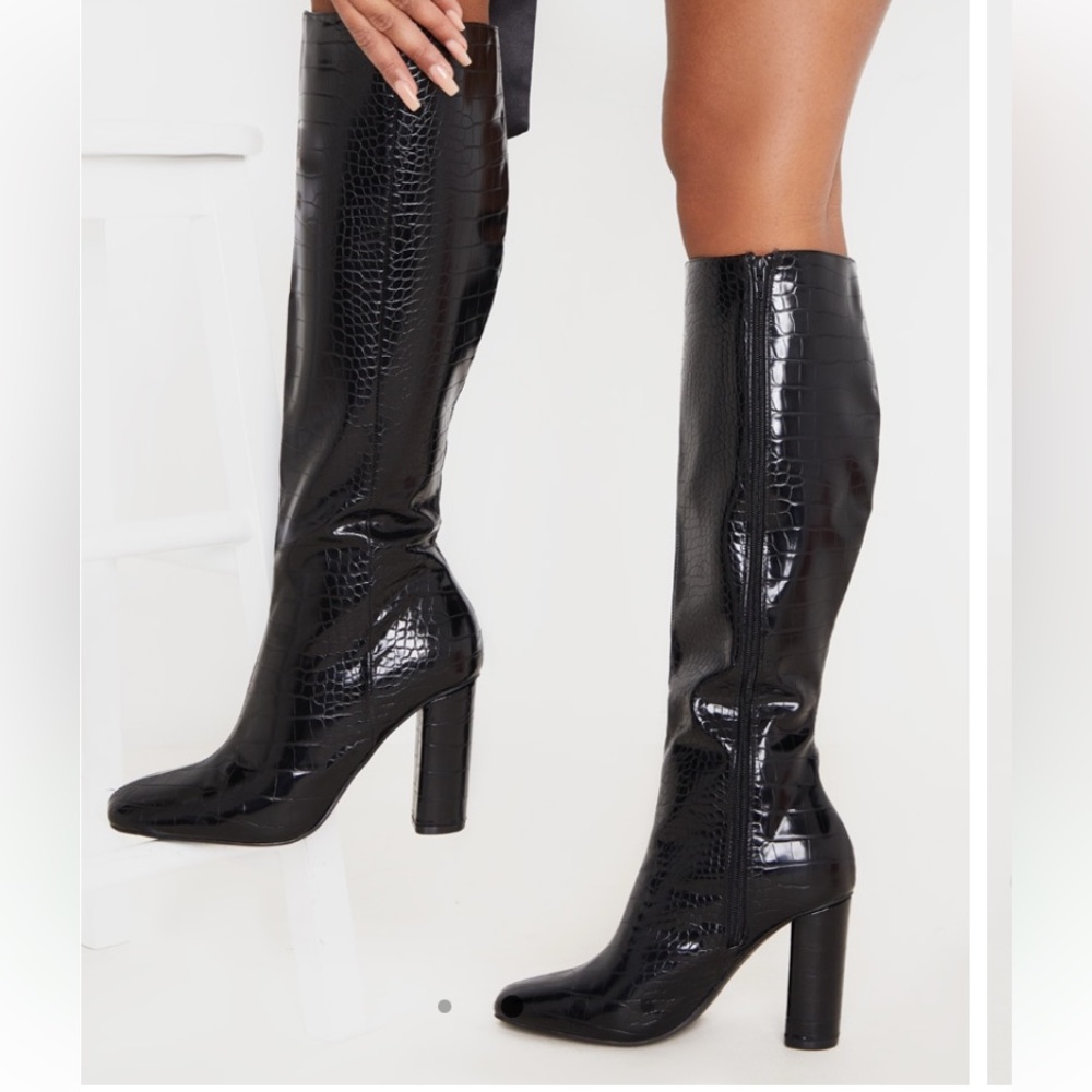 Black block knee high heeled boots